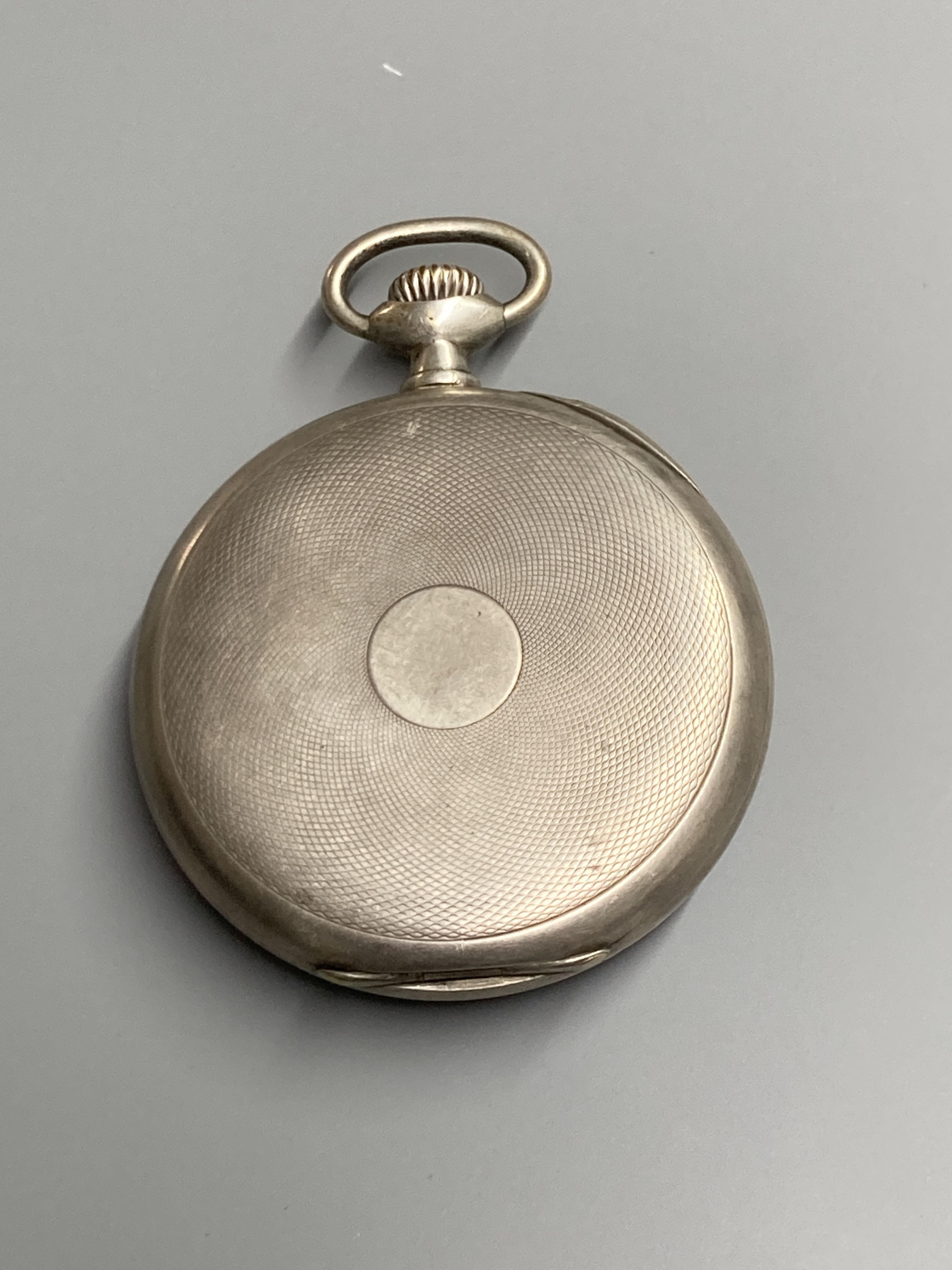 An early 20th century engine turned 800 standard Omega open face keyless pocket watch (glass a.f.)